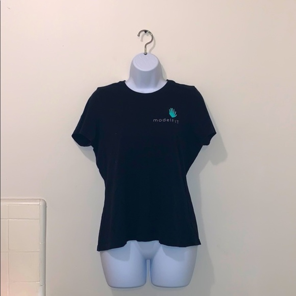 Women’s Black Bella+Canvas model FIT Tee